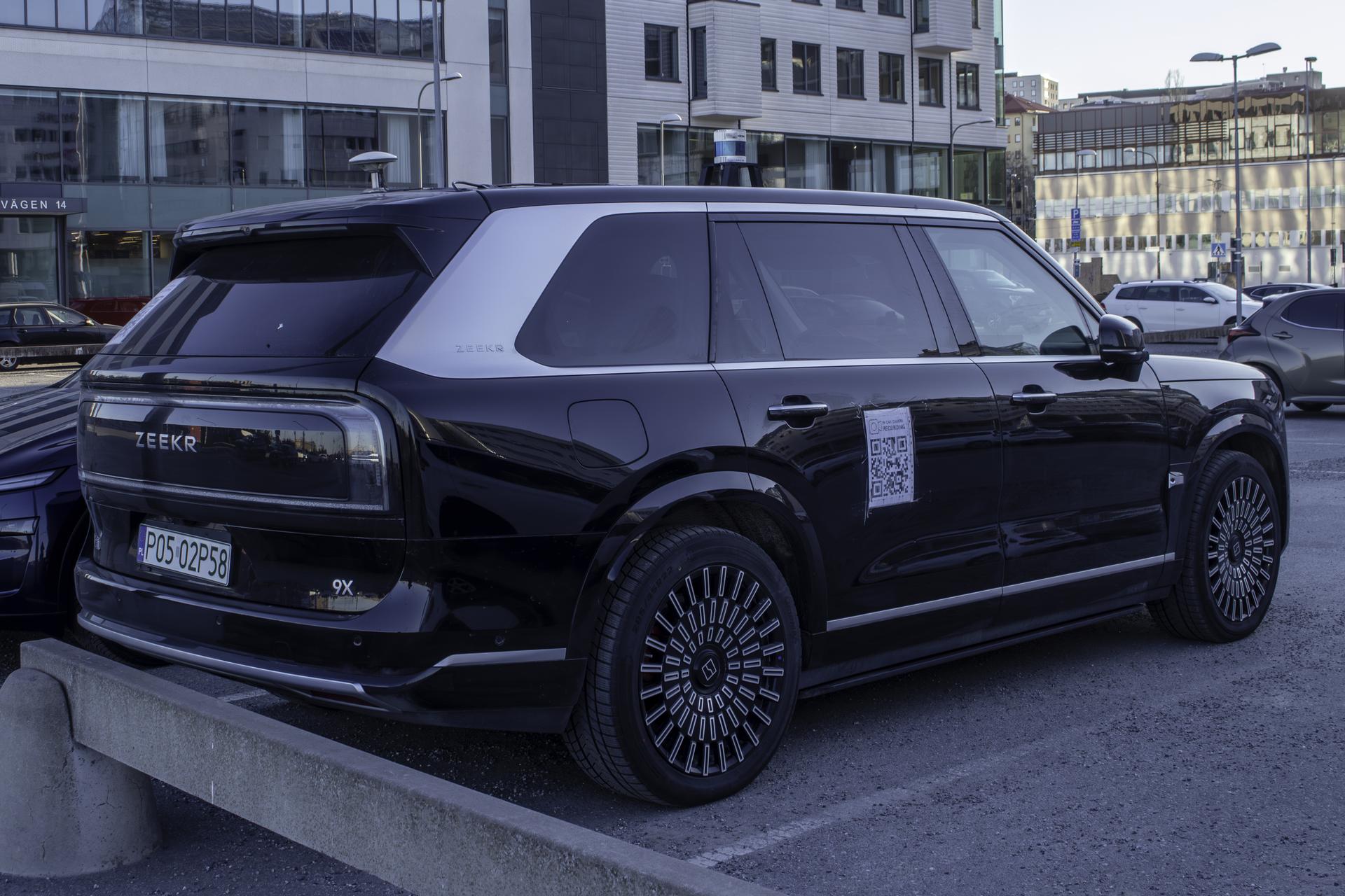 Zeekr 9X flagship SUV in black, front three-quarter view on display in Stockholm