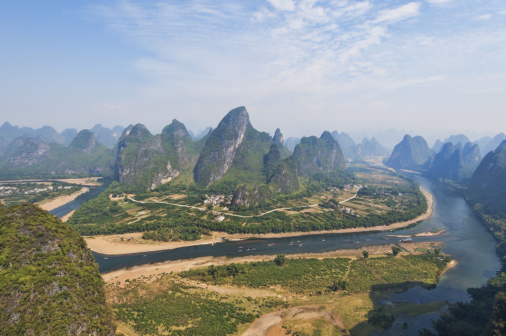 The great bend of the Li River curving around a cluster of karst towers between Guilin and Yangshuo