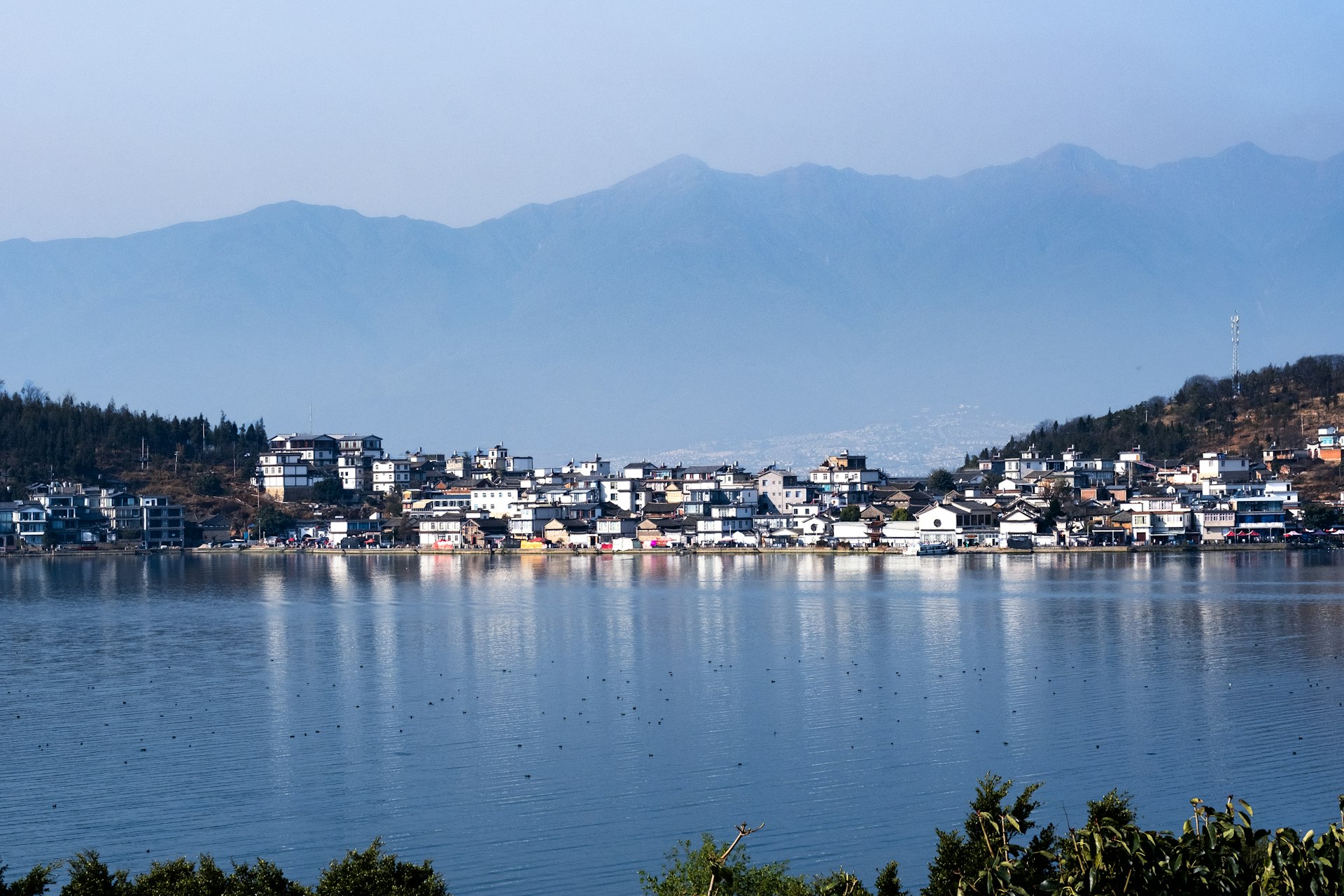 Erhai Lake and a Bai village under the wall of Cangshan mountain, Dali