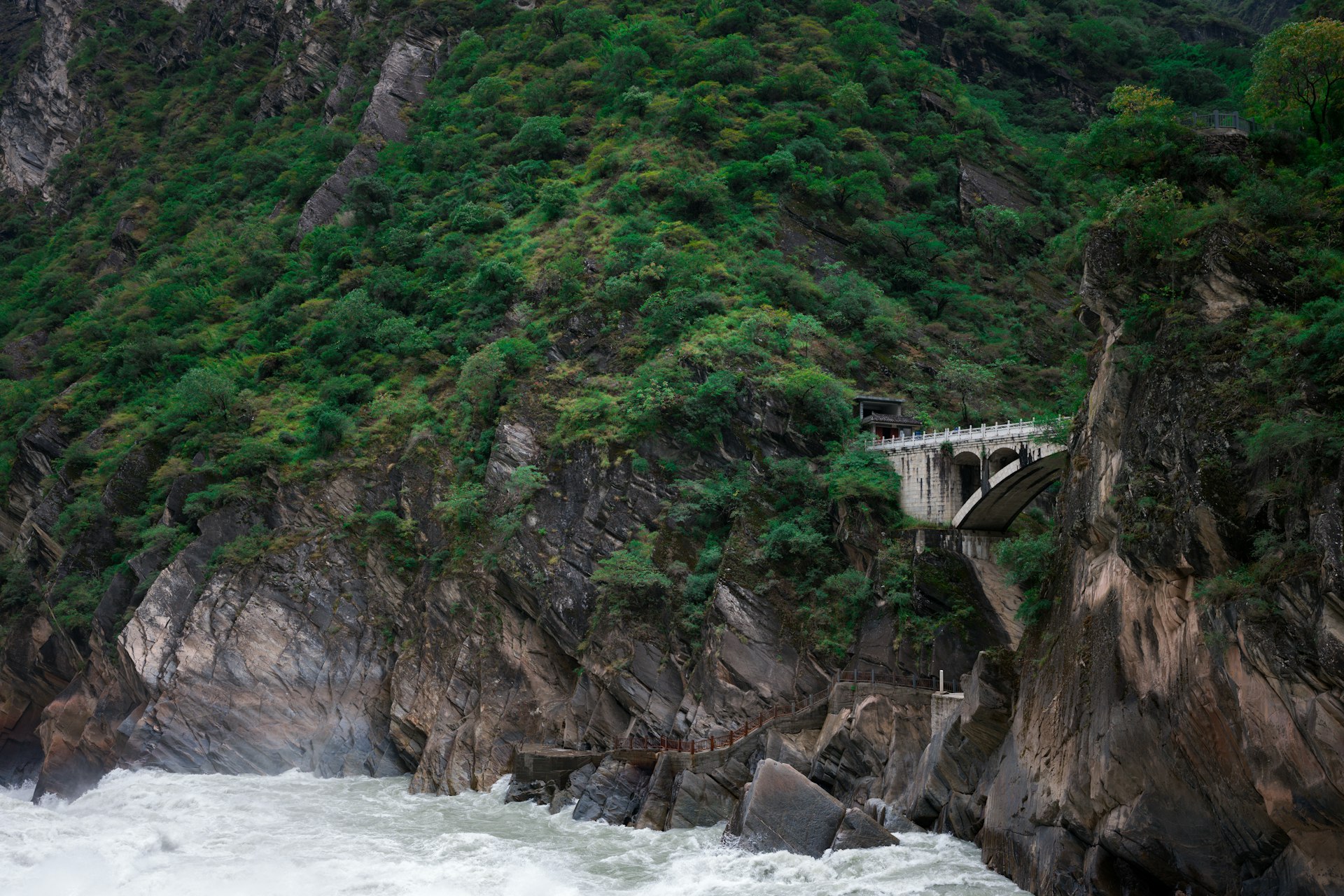 White water of the Jinsha river at Tiger Leaping Gorge below the cliff viewing platform