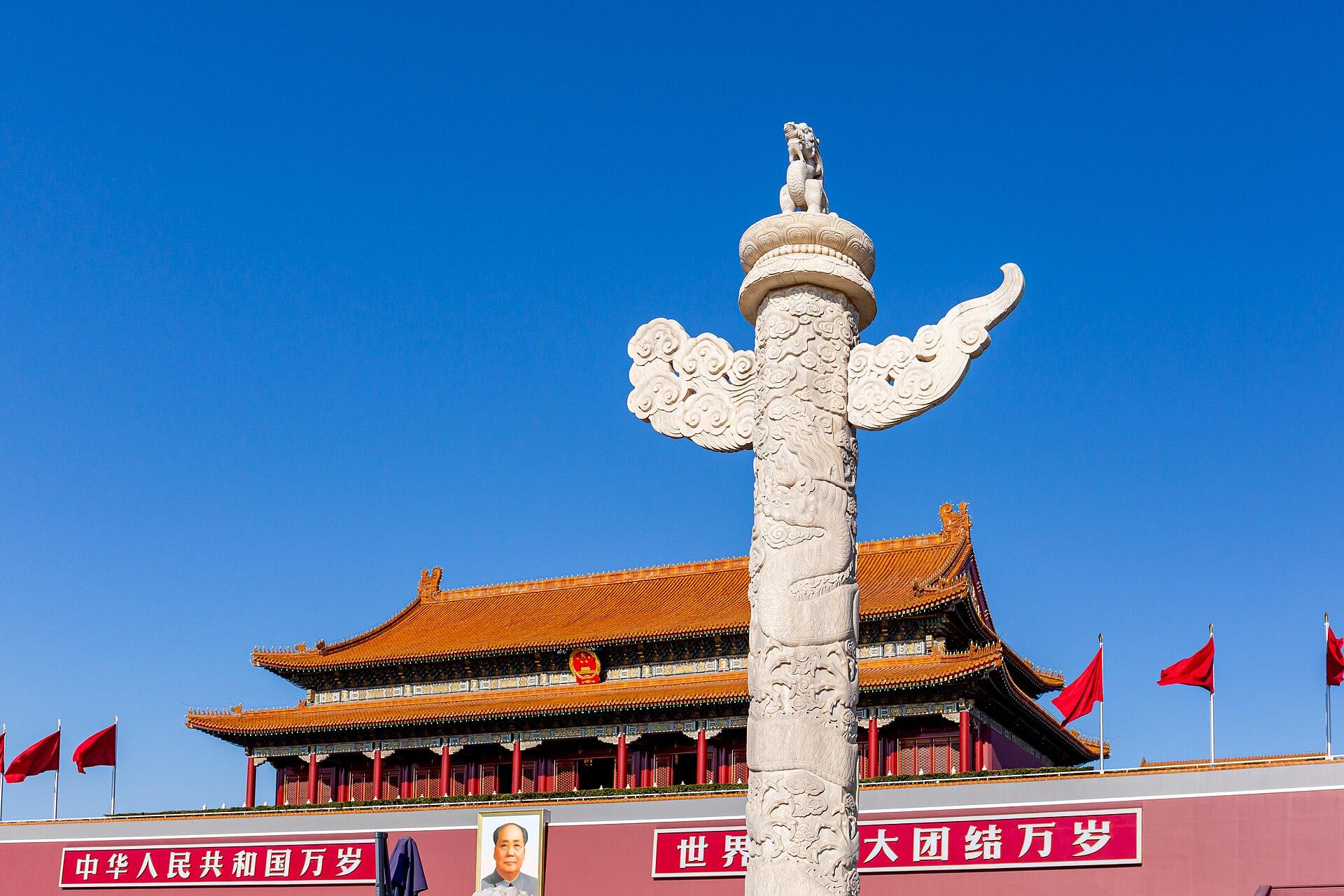A white marble huabiao column standing before the Tiananmen gate tower